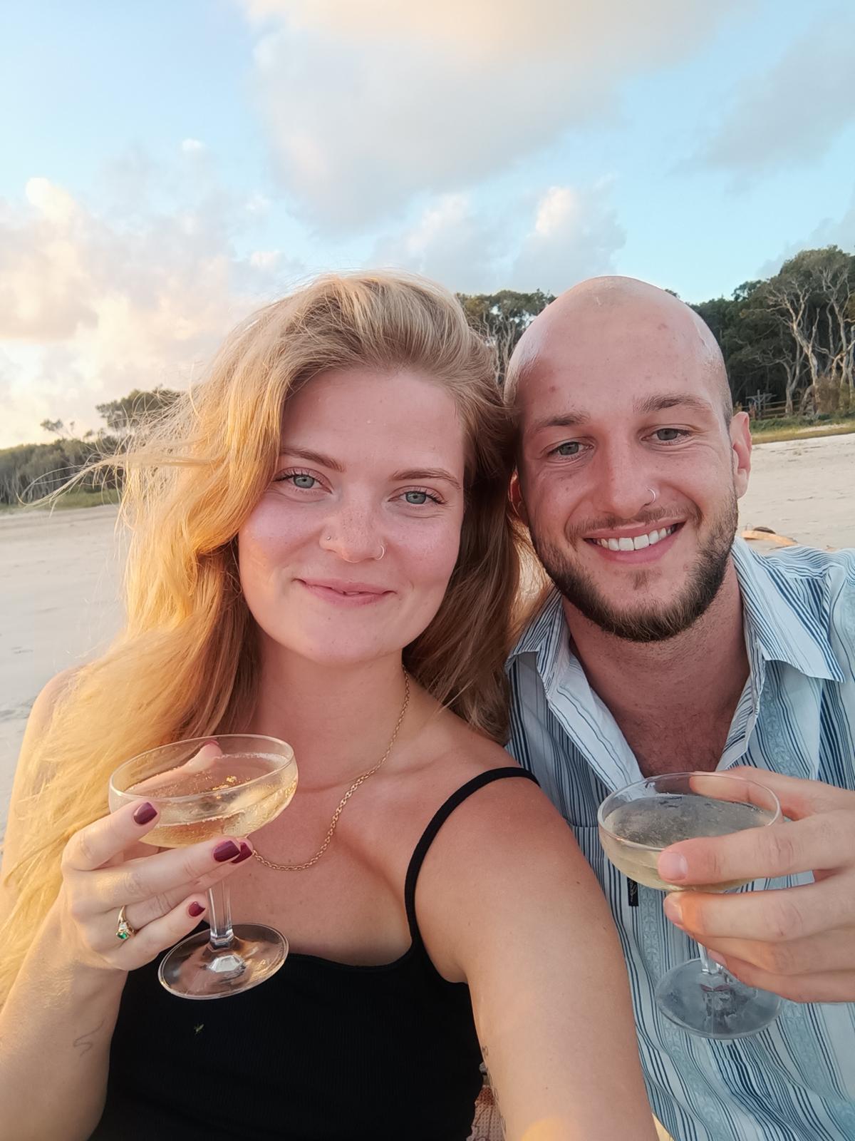 Natalie and Calvin on the beach at sunset